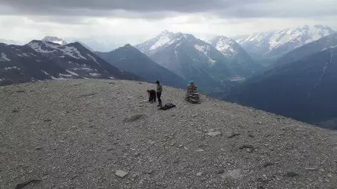 AI Video from prompt: A realistic raw documentary extreme wide aerial 