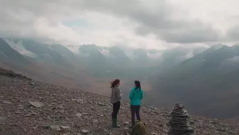 AI Video from prompt: A realistic raw documentary extreme wide aerial 