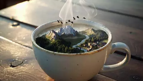 AI Video from prompt: A close-up of a steaming coffee cup on a wooden 