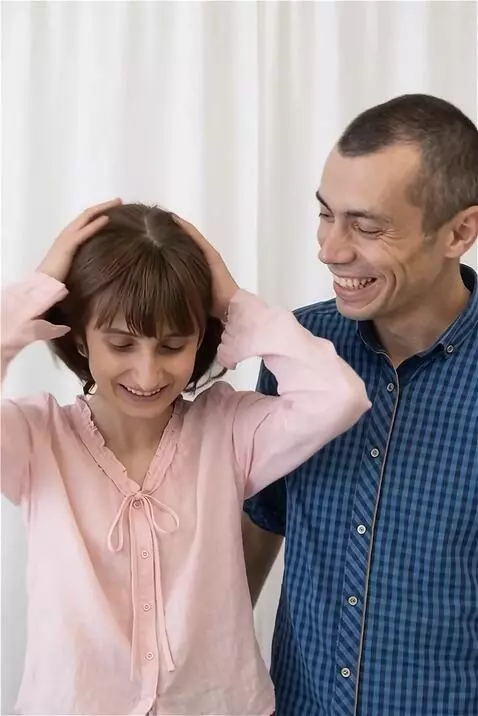 AI Video from prompt: the girl takes her hand off her head and straigh