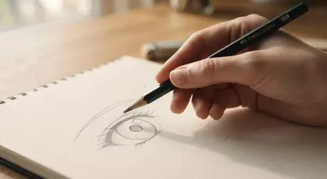 AI Video from prompt: The pencil's side gently sweeps left to right ac