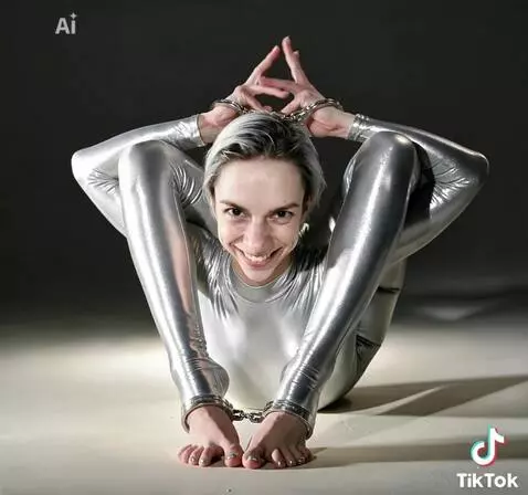 AI Video from prompt: Contortionist rapidly and mischevously fidgeting