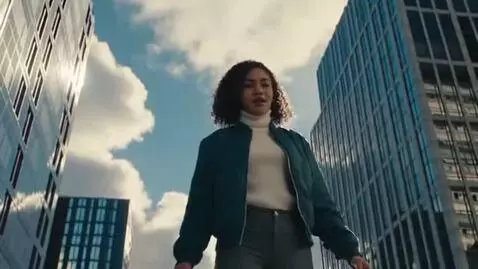 AI Video from prompt: A girl that’s grows huge and has her chest expan
