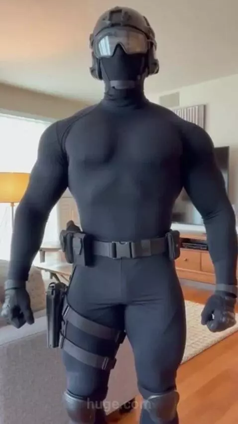 AI Video from prompt: His huge pectorals flex and bounce uncontrollabl