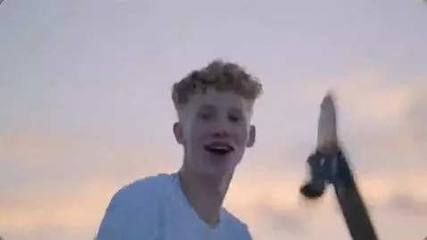 AI Video from prompt: Make him throw the skateboard at the camera and 