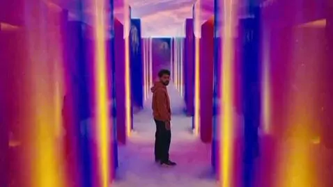 AI Video from prompt: A man takes psilocybin has a psychedelic experie