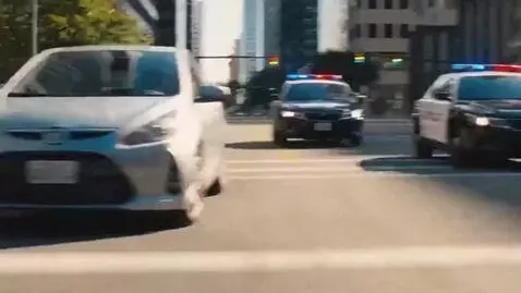 AI Video from prompt: Two monkeys stole a car and are being chased by 