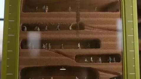 AI Video from prompt: A large ant farm but instead of ants use people.