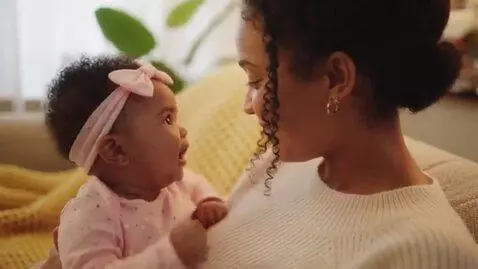 AI Video from prompt: A baby telling her mom “I love you” make the bab