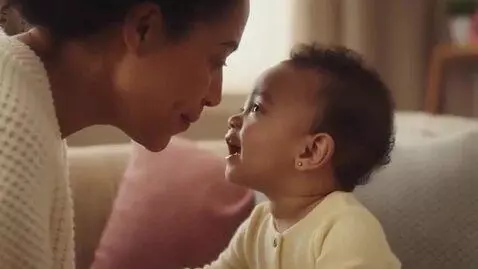 AI Video from prompt: Male a video of a baby telling her mom  "I love 