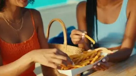 AI Video from prompt: a bikini influencer at a pool. a series of clips