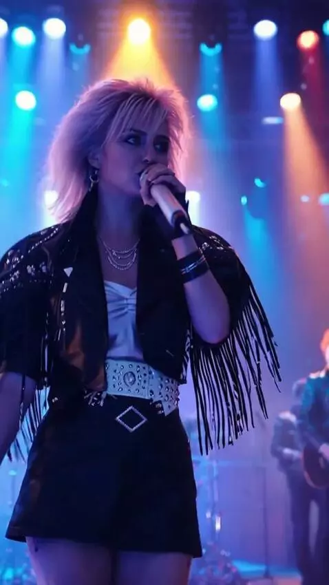 AI Video from prompt: The singer walks around the stage to the music, 