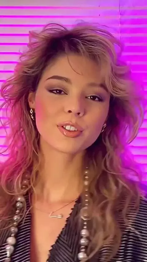 AI Video from prompt: The girl's face should resemble the original, an