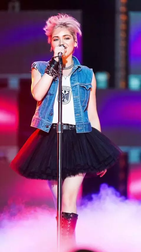AI Video from prompt: Madonna in a short tutu skirt sings and dances t