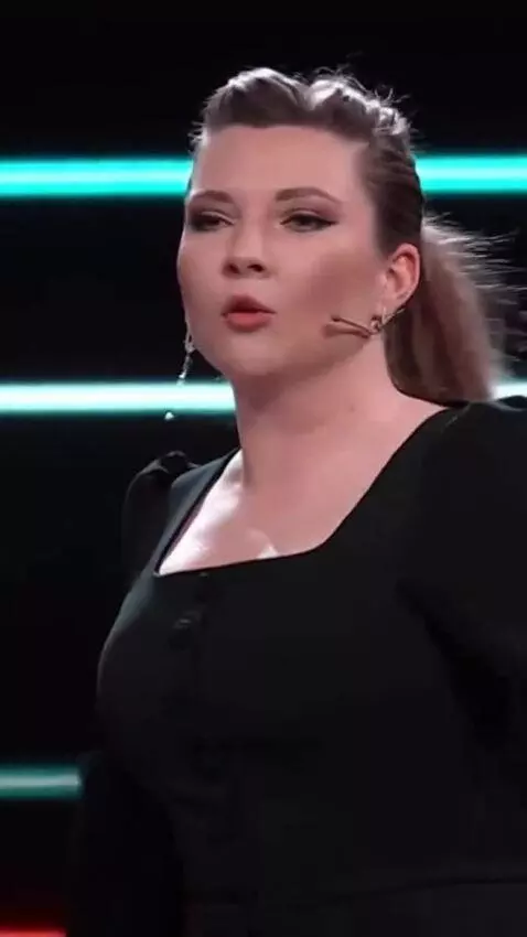 AI Video from prompt: The girl sings and does a pirouette