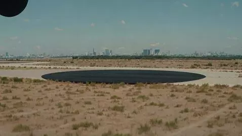 AI Video from prompt: Enormous black spheres arrive in Earth’s atmosph