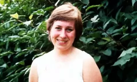 AI Video from prompt: A young woman posing for the camera with a subtl