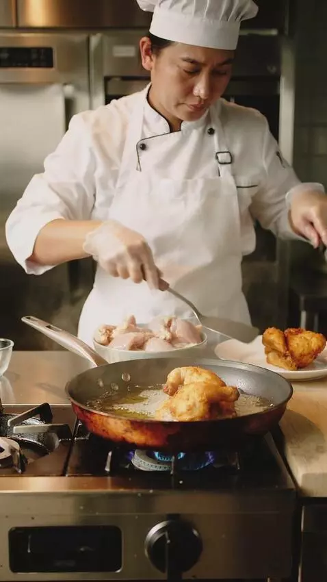 AI Video from prompt: COOKING FRIDCHIKCEN