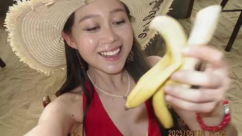 AI Video from prompt: licking a banana happily