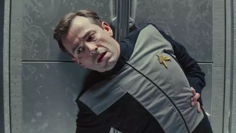 AI Video from prompt: Star Trek transporter malfunction. A man  is hal