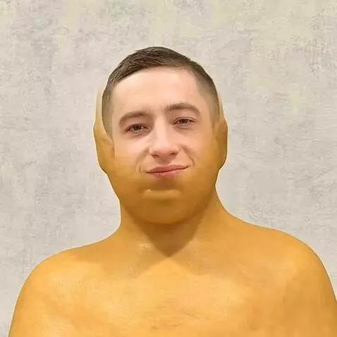 AI Video from prompt: This person transforms into a *Kolobok* (a chara