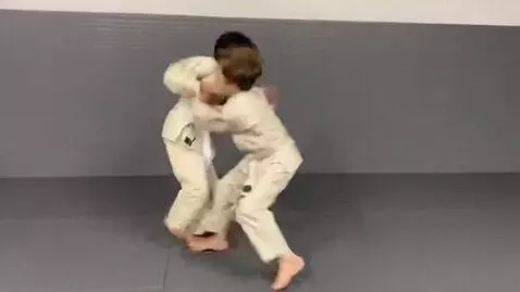 AI Video from prompt: two boys at six years,wearing bjj beige jackets,