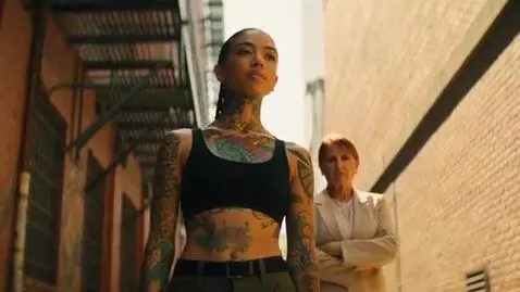 AI Video from prompt: A young woman took revenge on her enemy by tatto