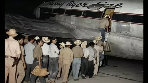 AI Video from prompt: Animate this picture of deported migrant workers