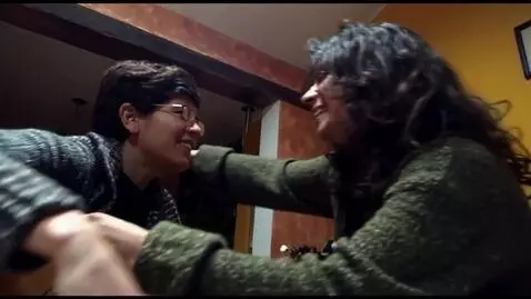 AI Video from prompt: A pregnant woman hugs the women