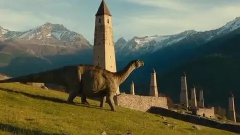 AI Video from prompt: The Ingushetia tower complex, where a dinosaur w