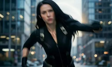 AI Video from prompt: Black Widow executing a hip throw: she twists he