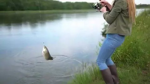 AI Video from prompt: A girl with a model‑like appearance is fishing w