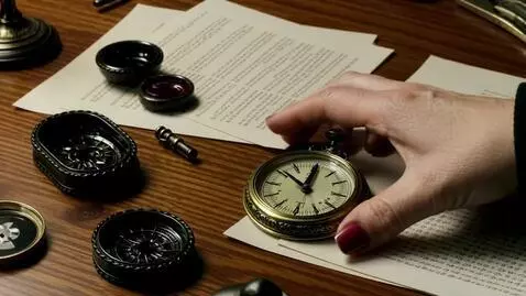 AI Video from prompt: In the frame, a human hand picks up a compass fr