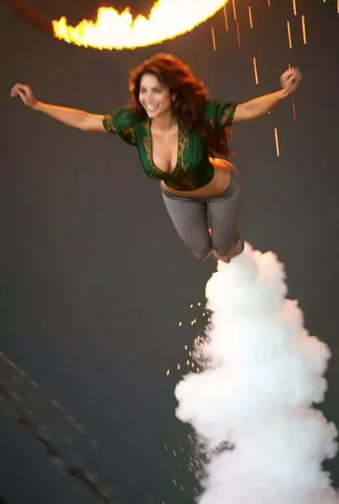 AI Video from prompt: she fired out of a circus cannon,  flies through