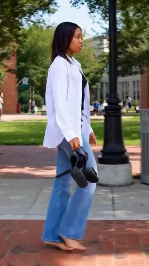 AI Video from prompt: African American woman, barefoot with slightly d