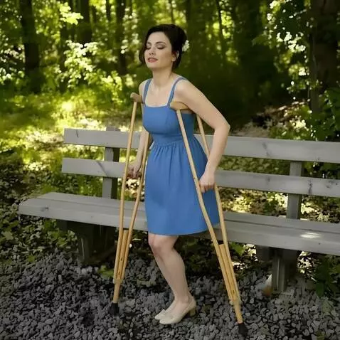 AI Video from prompt: Standing on her only (right) leg, a beautiful on