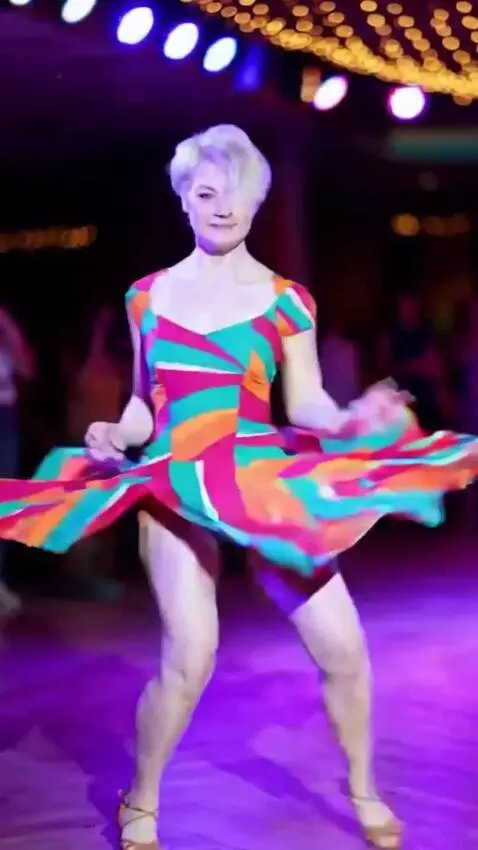 AI Video from prompt: Vika, wearing an ultra‑short dress, is performin