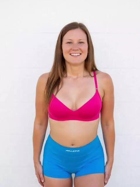 AI Video from prompt: A pregnant adult woman at 40 weeks is lying on h