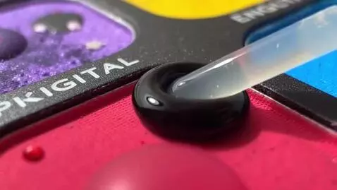 AI Video from prompt: Using Tiktok Booping Droplet On MakeUps, Saying 