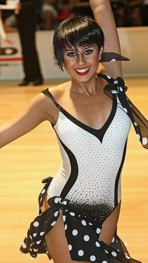AI Video from prompt: The singer is dancing the samba, bending over an
