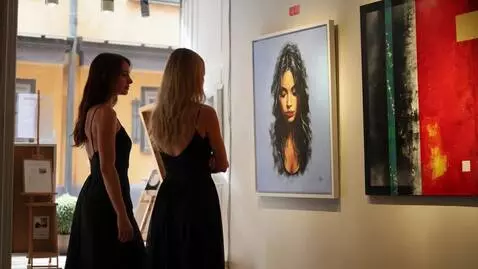 AI Video from prompt: two ladies talking to each other and looking at 