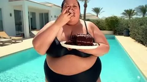 AI Video from prompt: Italian supermodel weighing 600 pounds in black 