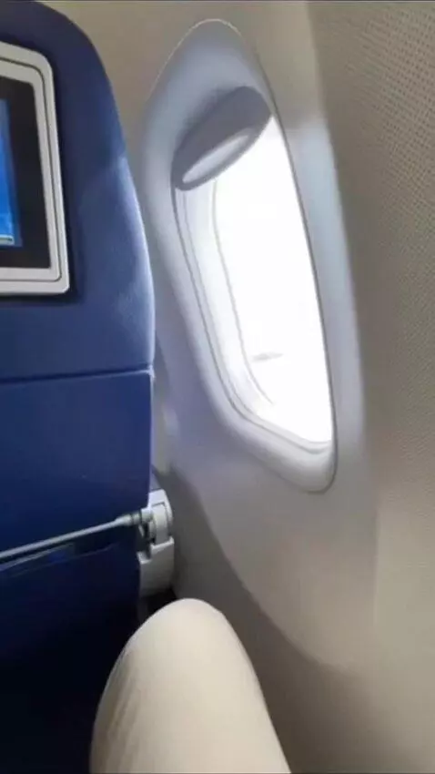 AI Video from prompt: In the first person. I ride a plane, sit straigh