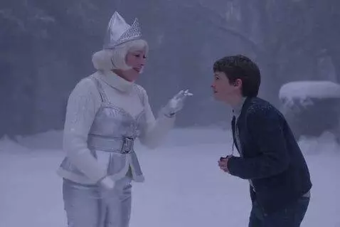 AI Video from prompt: A charming chubby sixty-year-old snow queen with