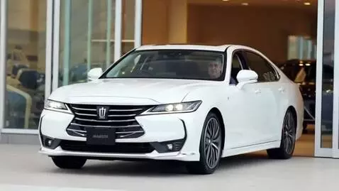 AI Video from prompt: Man hopes in his crown majesta 2022 model and dr
