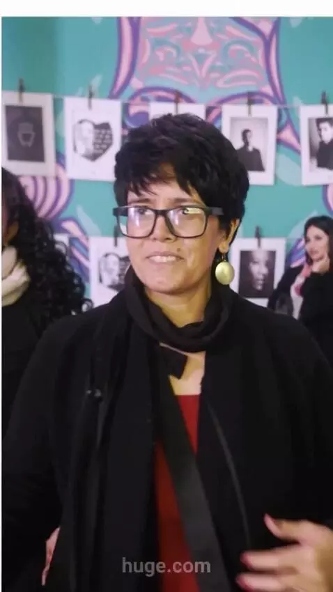 AI Video from prompt: The women shows off her clothes.full body image