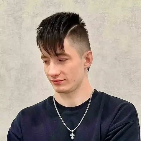 AI Video from prompt: This man's hair is falling out from the side of 