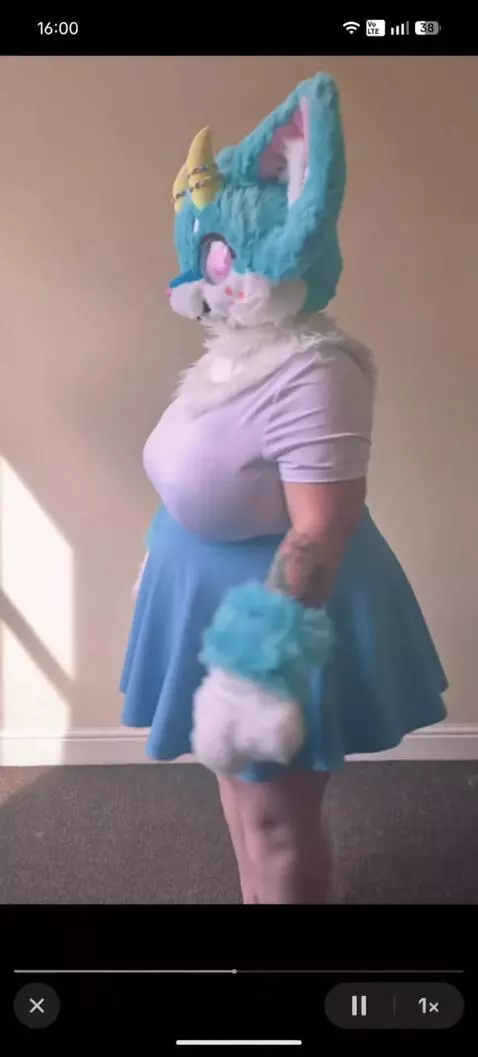 AI Video from prompt: Furry girl showing her side as her belly is infl