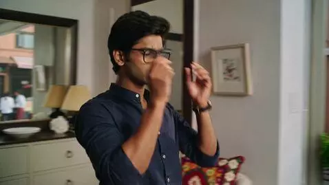 AI Video from prompt: Visual 1 (0:00–0:02) — A young Indian man puttin