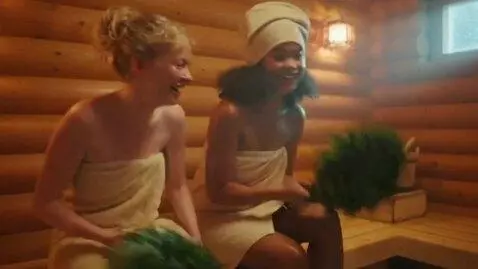 AI Video from prompt: The girls are in a log‑built Russian bathhouse, 